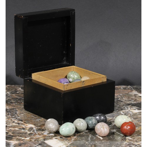 2096 - Geology - a collection of egg shaped polished stone and mineral samples, ebonised box