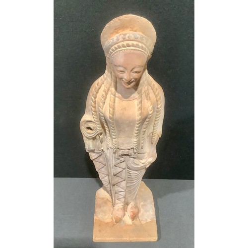 2040 - A Grand Tour terracotta figure, after an Ancient Greek kore, painted features, 69cm high