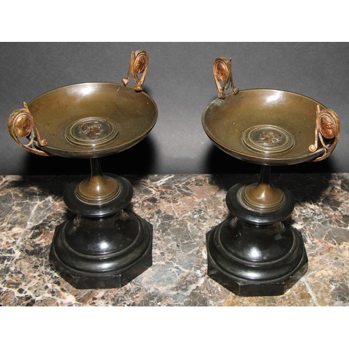 2086 - A pair of 19th century parcel-gilt and brown patinated bronze tazzas, in the Grand Tour taste, each ... 