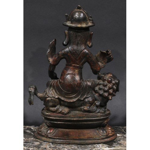 460 - Chinese/Tibetan School, a bronze, Vaishravana, lotus base, 27.5cm high