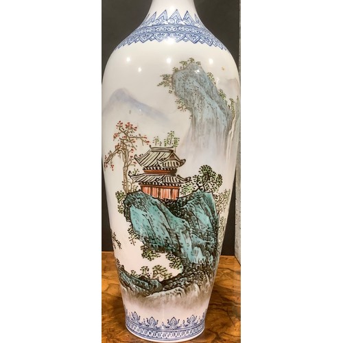 448 - A Chinese slender baluster vase, painted in polychrome with a monumental landscape, 31.5cm high, sea... 