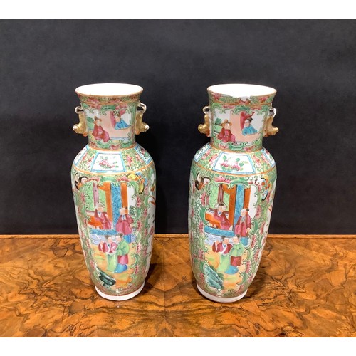 358 - A pair of Chinese famille rose ovoid vases, painted in the typical Cantonese manner, 25cm high, Cant... 