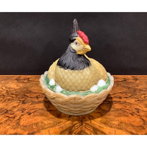 2191 - A Vallerysthal pressed glass novelty egg box and cover, as a chicken on a nest, 19cm long