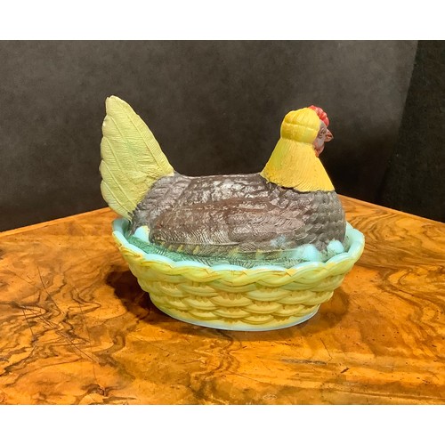 2192 - A Vallerysthal pressed glass novelty egg box and cover, as a chicken, on a blue opaline nest, 13.5cm... 