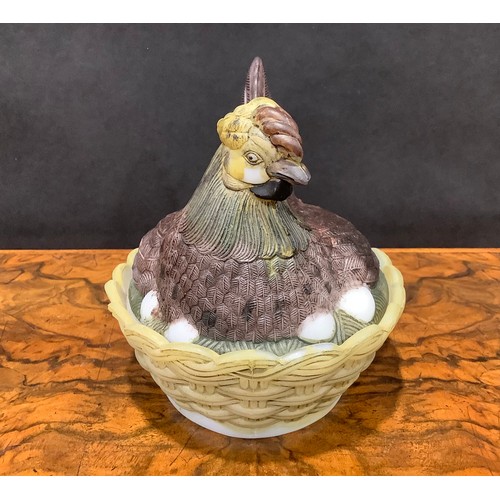 2190 - A Vallerysthal pressed glass novelty egg box and cover, as a chicken on a nest, 17cm long