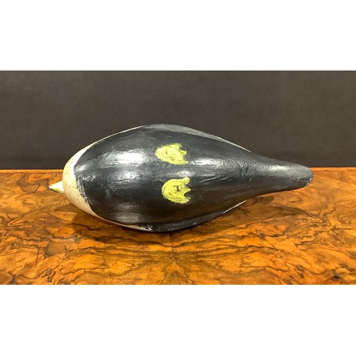 2079 - A painted softwood avian decoy, carved as a water fowl, 26cm long