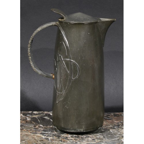 2047 - Liberty & Co - a Tudric pewter hot water jug, designed by Archibald Knox, in relief with stylised or... 