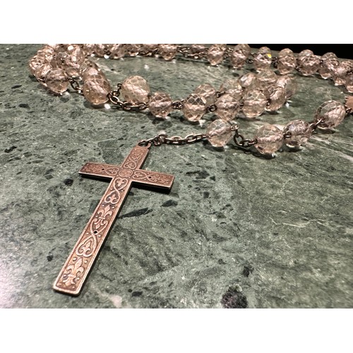 2062 - Roman Catholicism - a French silver coloured metal and clear glass rosary bead necklace, 58cm long