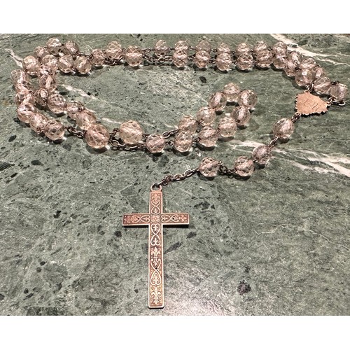 2062 - Roman Catholicism - a French silver coloured metal and clear glass rosary bead necklace, 58cm long