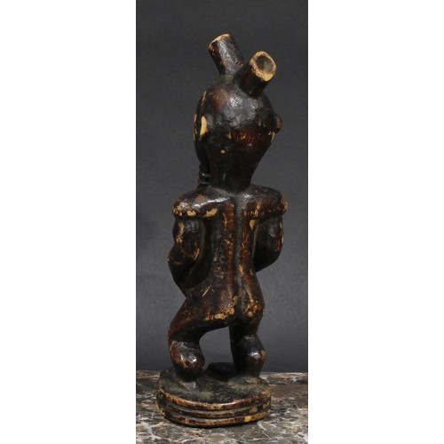 2538 - Tribal Art - a Senufo figure, 22.5cm high, Ivory Coast; etc (2)