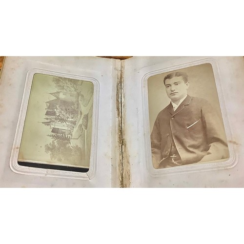 2704 - Photography - a 19th century tooled and gilt red morocco carte de visite album, enclosing a collecti... 