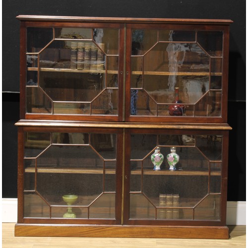 1249 - A 19th century mahogany library bookcase, moulded top above a pair of astragal glazed doors, the pro... 