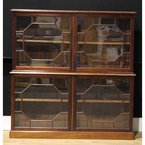 1249 - A 19th century mahogany library bookcase, moulded top above a pair of astragal glazed doors, the pro... 