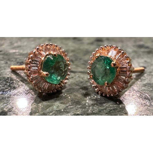 906 - A pair of Iliana emerald and diamond earrings, each with central round cut mid green emerald, approx... 