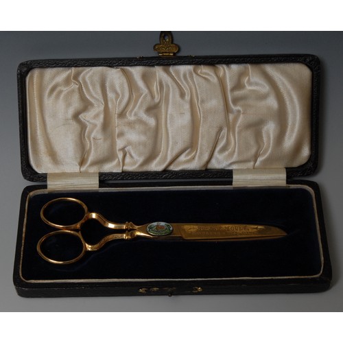 2049 - Local Interest - a pair of inscribed ceremonial gilt scissors, set with an oval enamel cabochon pain... 