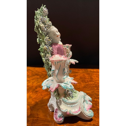 222 - A pair of Derby figural candlesticks, before floral bocage, of children Liberty and Matrimony, the g... 