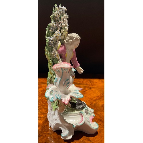 222 - A pair of Derby figural candlesticks, before floral bocage, of children Liberty and Matrimony, the g... 