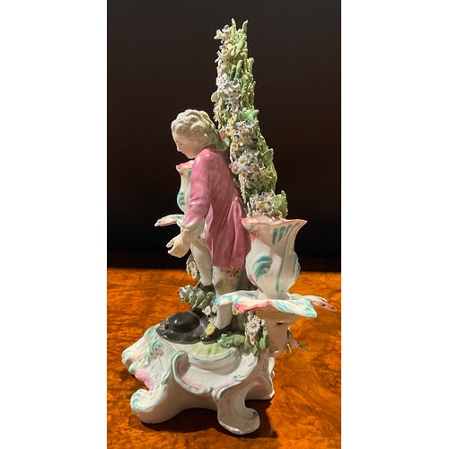 222 - A pair of Derby figural candlesticks, before floral bocage, of children Liberty and Matrimony, the g... 