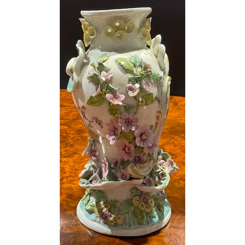 221 - A Derby Patch Mark Rococo style pedestal vase, painted in polychrome with fanciful birds, encrusted ... 