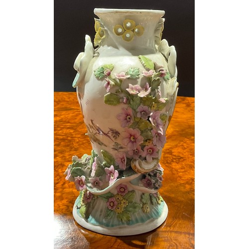 221 - A Derby Patch Mark Rococo style pedestal vase, painted in polychrome with fanciful birds, encrusted ... 