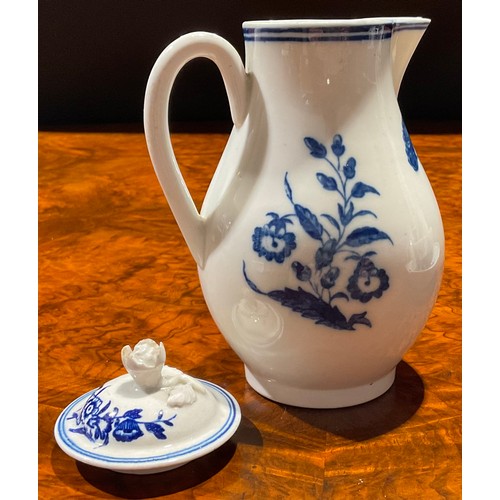 125 - A Caughley Three Flowers pattern sparrow beak jug and cover, decorated in underglaze blue, flower fi... 