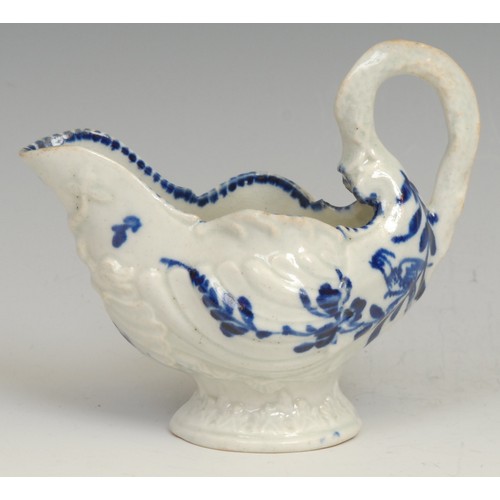 179 - A Liverpool dolphin ewer cream jug, in relief with shell moulding, the spout with entwined dolphins,... 