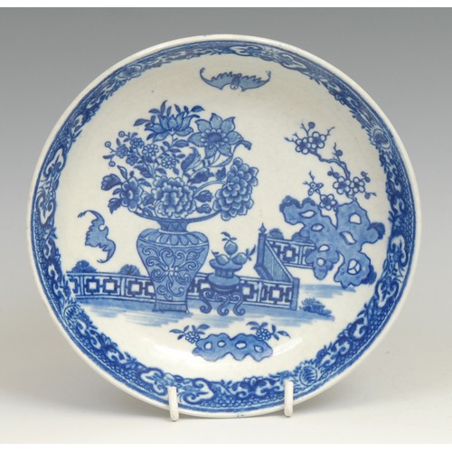 198 - A Worcester Bat pattern dish, decorated in underglaze blue with a chinoiserie garden, 16cm diameter,... 