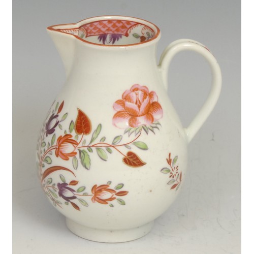 210 - A Worcester sparrow beak jug, decorated in Chinese export style with flowers, the interior with scal... 