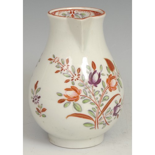 210 - A Worcester sparrow beak jug, decorated in Chinese export style with flowers, the interior with scal... 