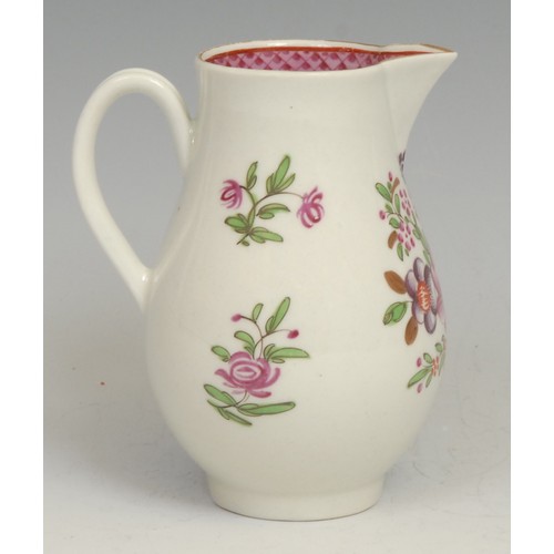 211 - A Worcester sparrow beak jug, decorated in Chinese export style with flowers, the interior with scal... 