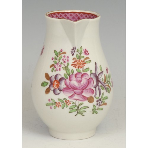 211 - A Worcester sparrow beak jug, decorated in Chinese export style with flowers, the interior with scal... 