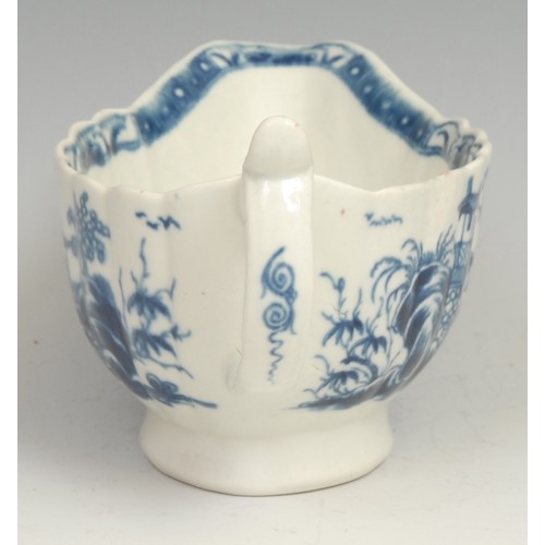 187 - A rare Worcester The Mission Church pattern fluted sauceboat, decorated in underglaze blue with a pa... 