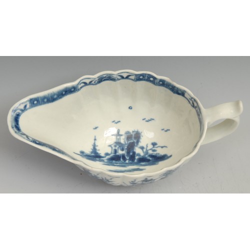 187 - A rare Worcester The Mission Church pattern fluted sauceboat, decorated in underglaze blue with a pa... 