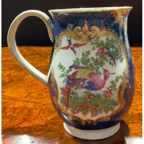 184 - A large Worcester bell shaped mug, painted with fanciful birds within gilt cartouches, the scale blu... 