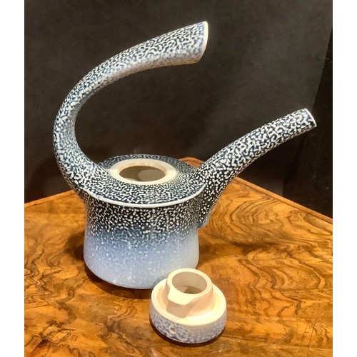 11 - Studio Pottery - A salt glazed teapot, of dynamic form, by Jeremy Nichols, in deep blue, fading to p... 