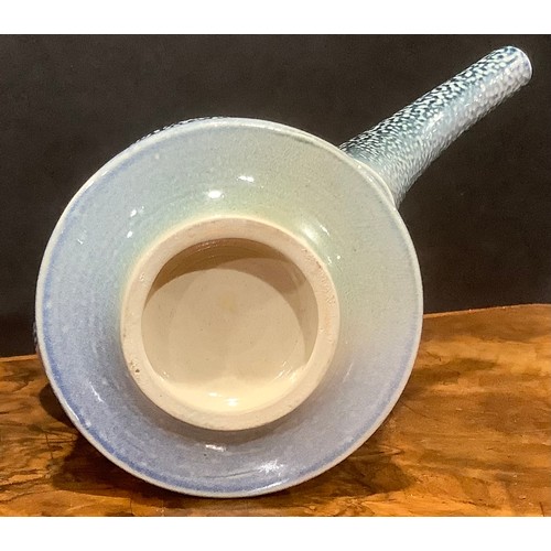 11 - Studio Pottery - A salt glazed teapot, of dynamic form, by Jeremy Nichols, in deep blue, fading to p... 