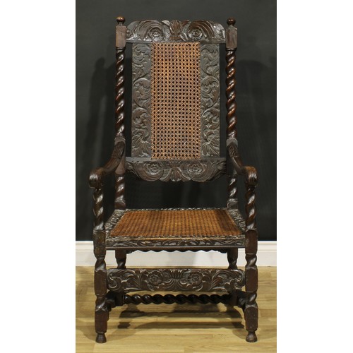 1291 - A 19th century Charles II Revival armchair, carved and caned in the traditional Carolean manner, 117... 