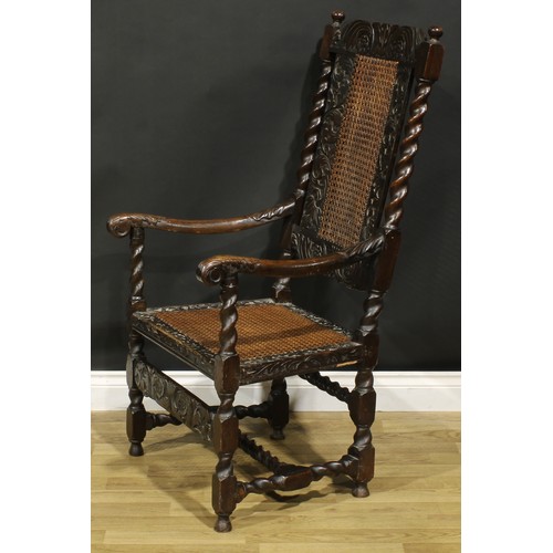 1291 - A 19th century Charles II Revival armchair, carved and caned in the traditional Carolean manner, 117... 