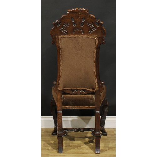 1284 - A 19th century Anglo-Dutch walnut side chair, in the manner of Daniel Marot, shaped back carved with... 