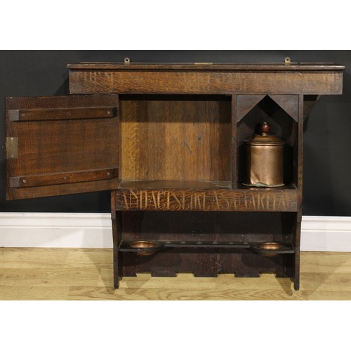 1635 - Liberty & Co - an Arts & Crafts oak smoking room cabinet, decorated in gilt with a lion rampant and ... 