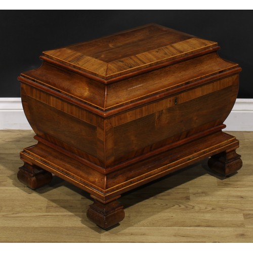 1527 - A 19th century rosewood sarcophagus liquor chest, hinged top enclosing an arrangement of parcel-gilt... 