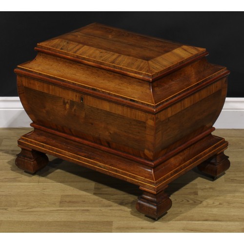 1527 - A 19th century rosewood sarcophagus liquor chest, hinged top enclosing an arrangement of parcel-gilt... 