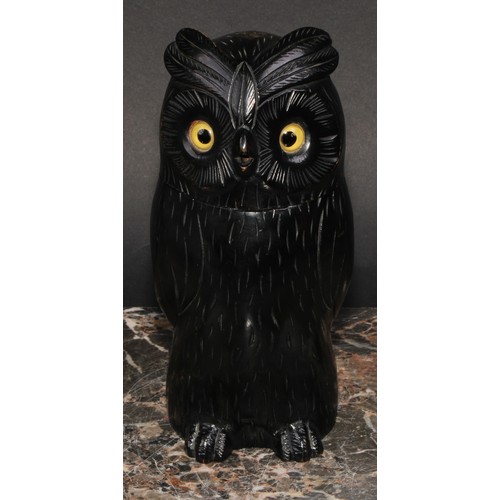 2148 - An early 20th century ebonised novelty string box, as an owl, glass eyes, 18.5cm high