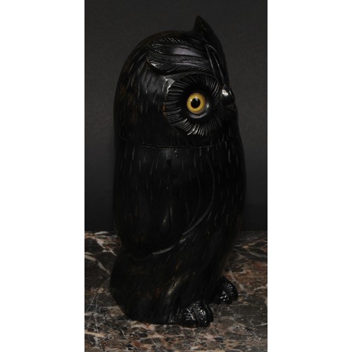 2148 - An early 20th century ebonised novelty string box, as an owl, glass eyes, 18.5cm high