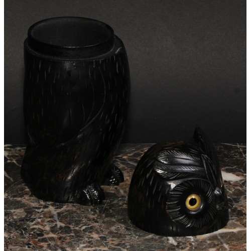 2148 - An early 20th century ebonised novelty string box, as an owl, glass eyes, 18.5cm high