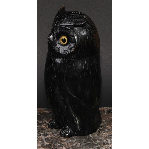 2148 - An early 20th century ebonised novelty string box, as an owl, glass eyes, 18.5cm high