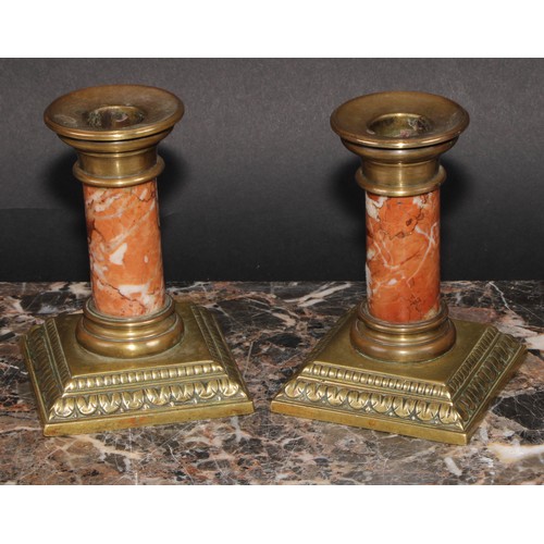 2143 - A pair of early 20th century bronze and marble dwarf candlesticks, acanthus borders, 11.5cm high, c.... 