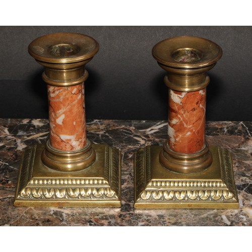 2143 - A pair of early 20th century bronze and marble dwarf candlesticks, acanthus borders, 11.5cm high, c.... 