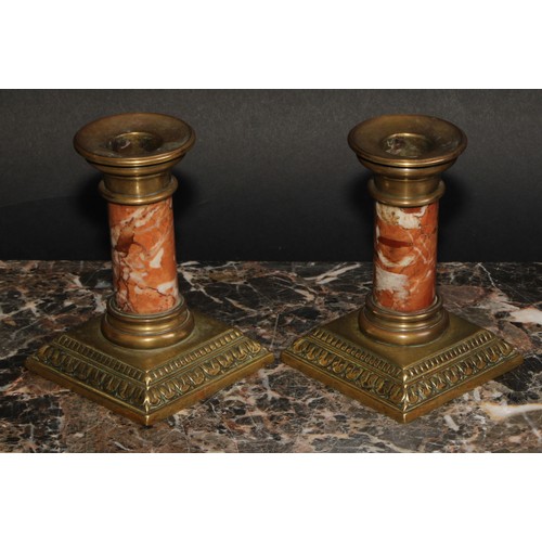 2143 - A pair of early 20th century bronze and marble dwarf candlesticks, acanthus borders, 11.5cm high, c.... 