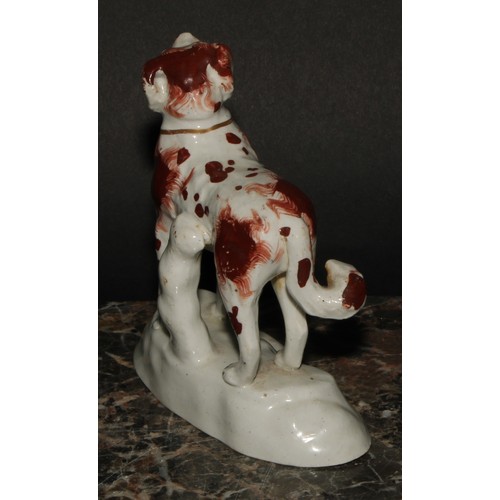 115 - A 19th century Staffordshire model, of a panting spaniel, picked out in rust brown, gilt line collar... 